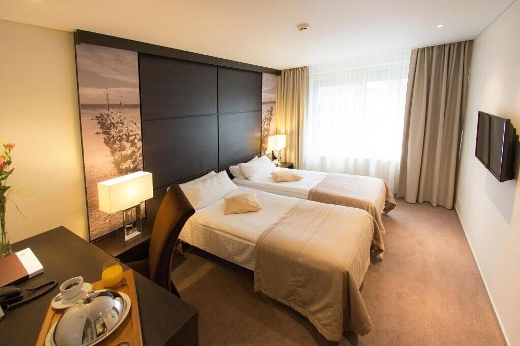 Панорама Amberton Klaipeda 4*