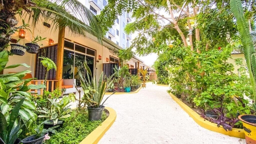 Изображение Manta Dhangethi Guest House коттедж