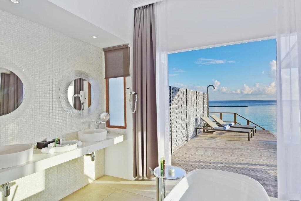 Вид Kuramathi Island Resort 4*