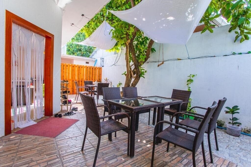 Фотография Alaika Maafushi Guest House гостиный двор