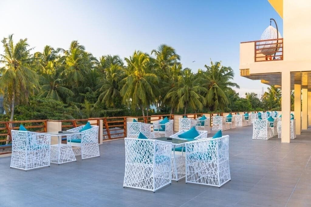 Вид White Sand Dhigurah Guest House гостиный двор