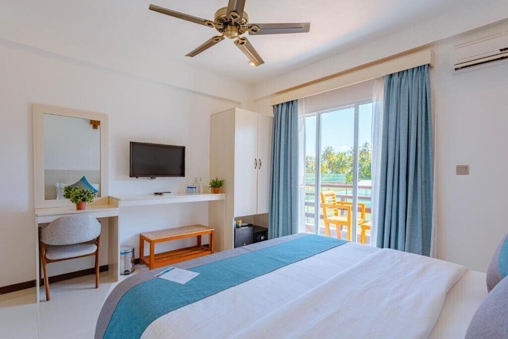 Апартаменты Dhiguveli Breeze Guest House 3*