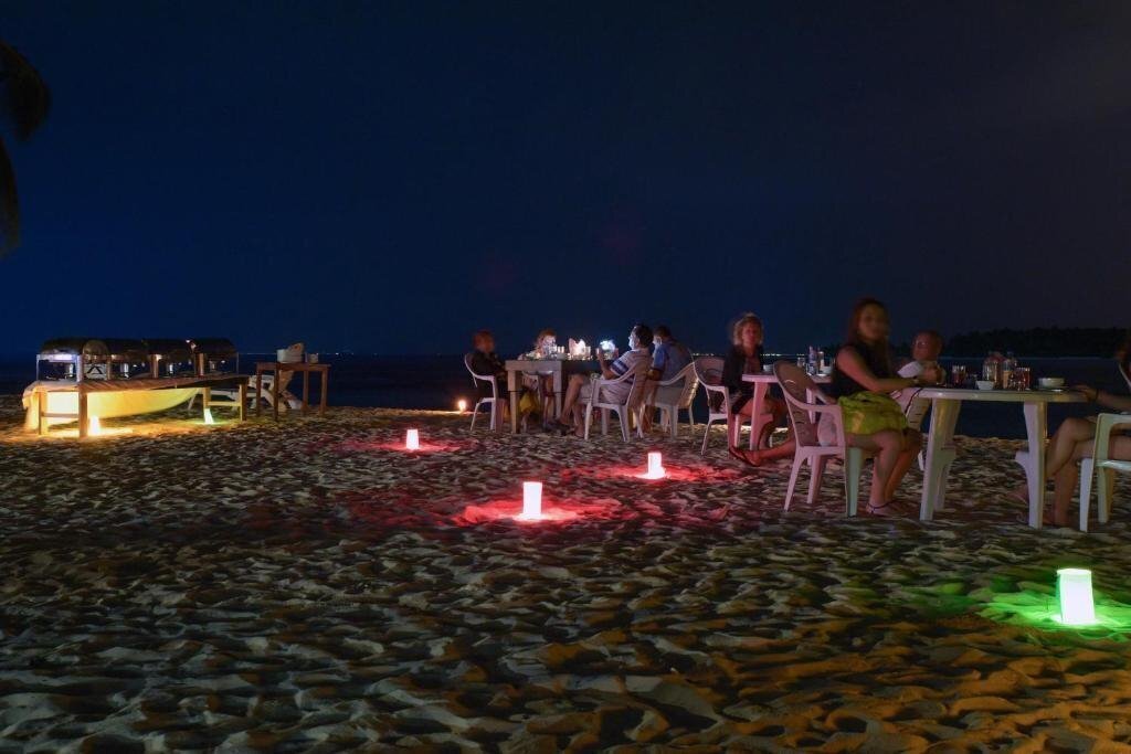 Вид Madi Finolhu Guest House гостиный двор