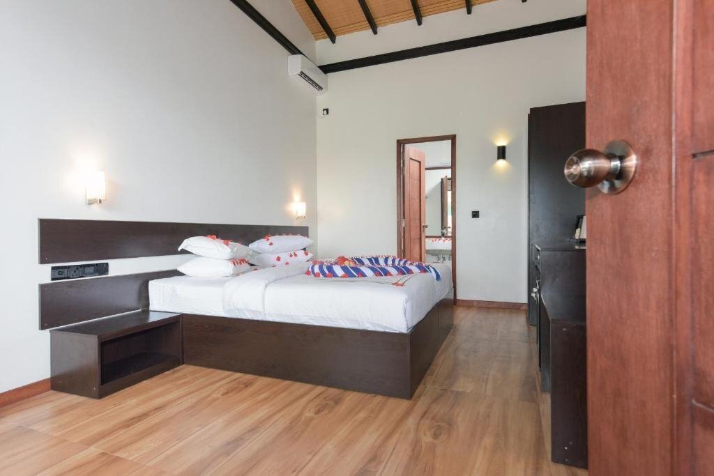 Территория Madi Finolhu Guest House гостиный двор