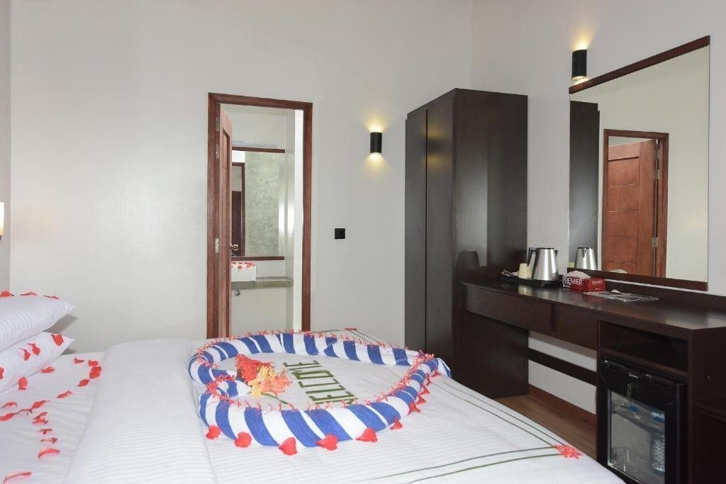 Апартаменты Madi Finolhu Guest House гостиный двор