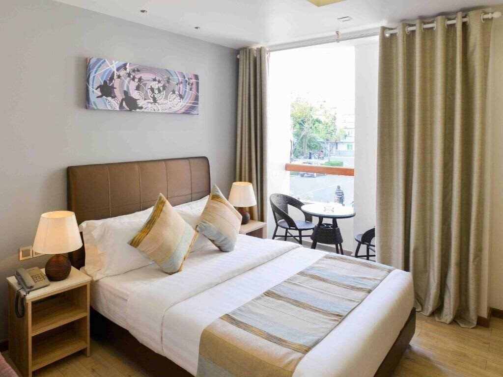 Отель Coconut Tree Hulhuvilla Beach 4*