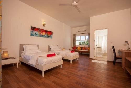 Изображение Evexia Beach Collection Laamu Guest House 1*