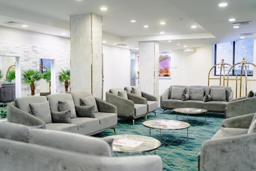 Апартаменты Manhattan Business Hotel 4*