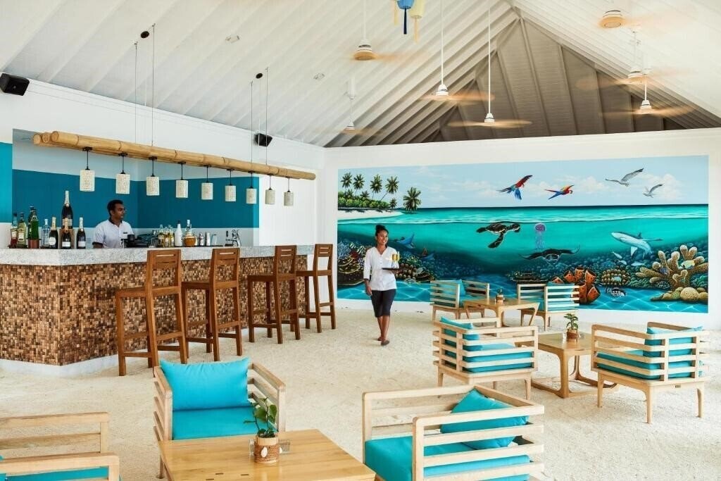 Фото Olhuveli Beach & Spa Resort 4*