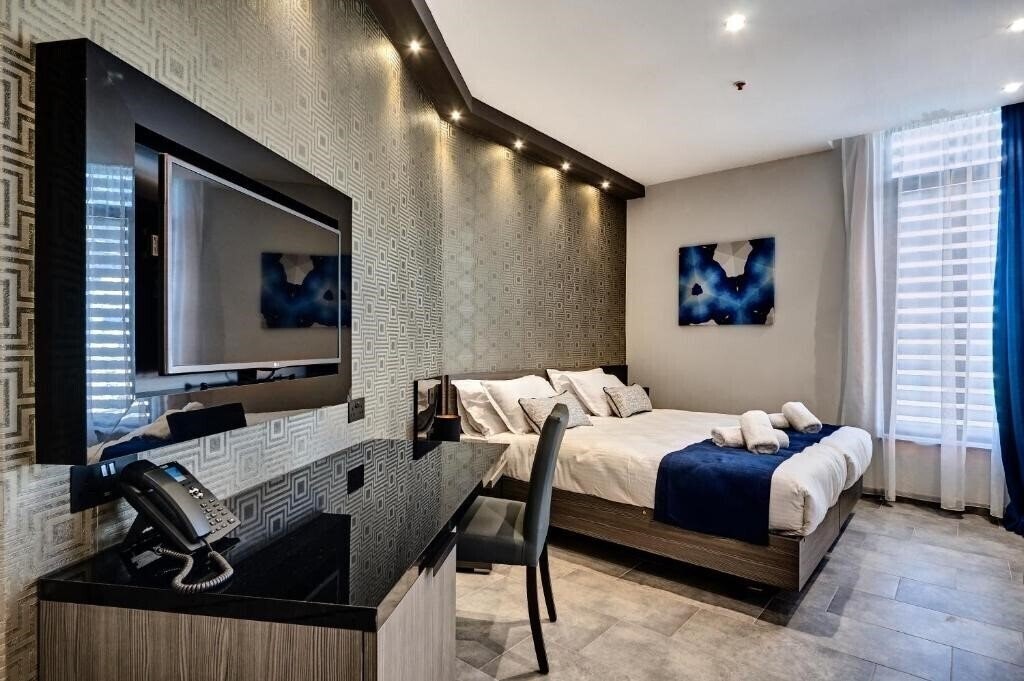 Отель The District Hotel Boutique 3*