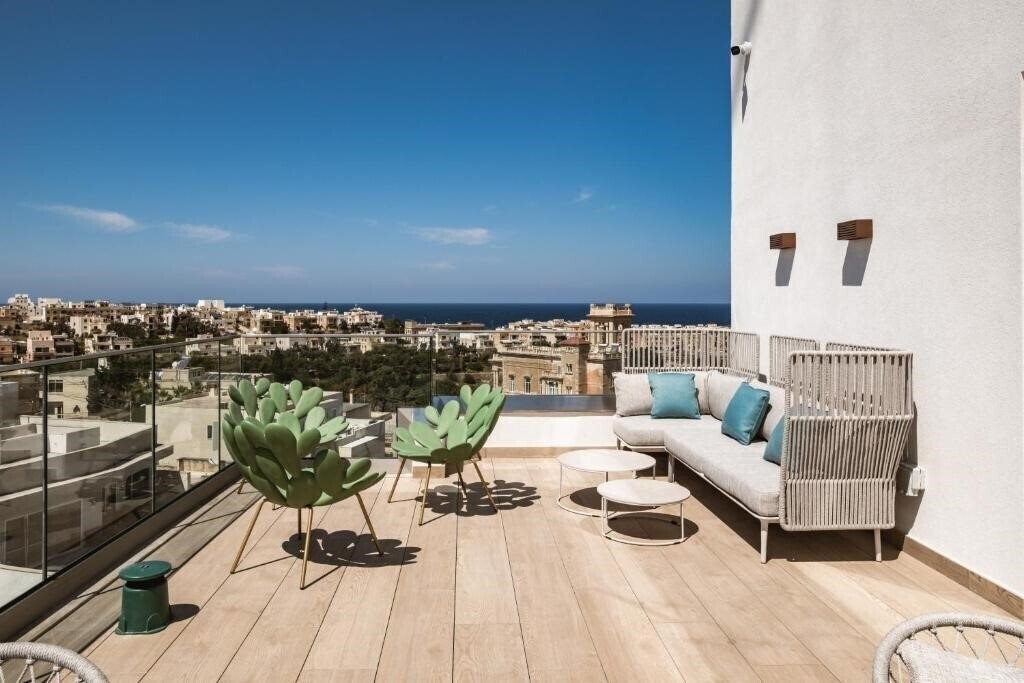 Фото AC Hotel St. Julian's 4*