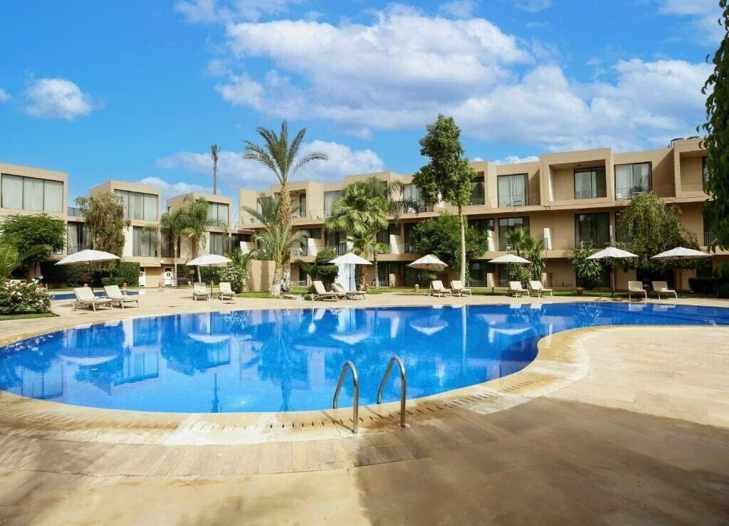 Отель Golden Tulip Rawabi 4*