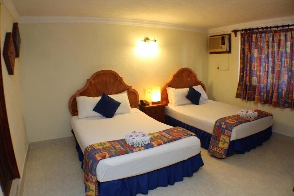 Апартаменты Suites Cancun Center 3*