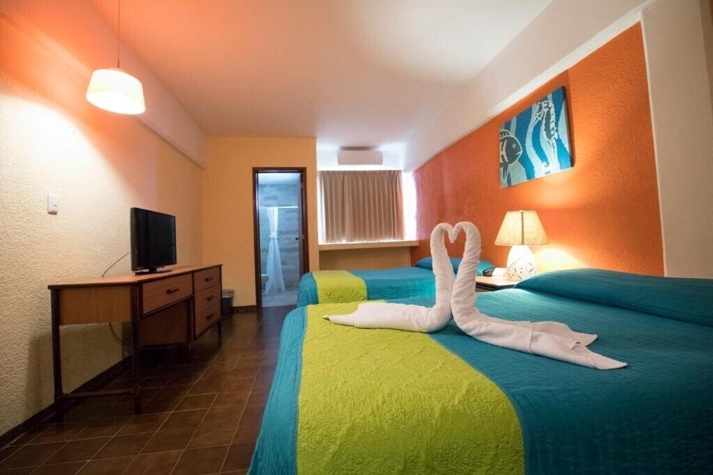 Апартаменты Hotel Plaza Cozumel 3*