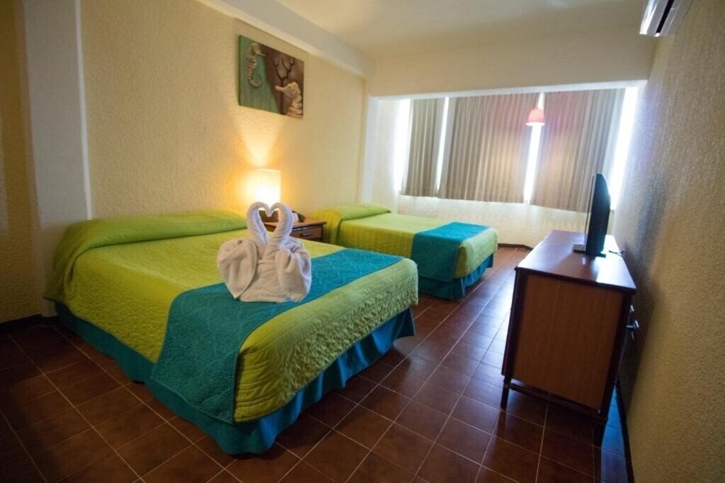 Панорама Hotel Plaza Cozumel 3*