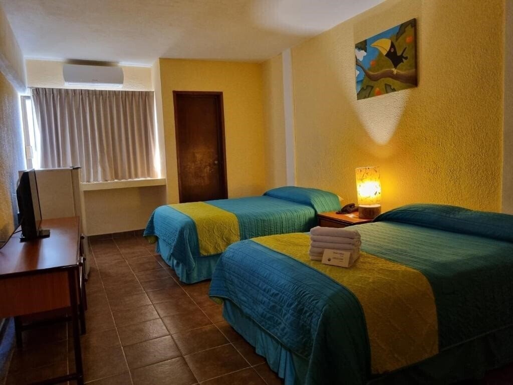 Фото Hotel Plaza Cozumel 3*
