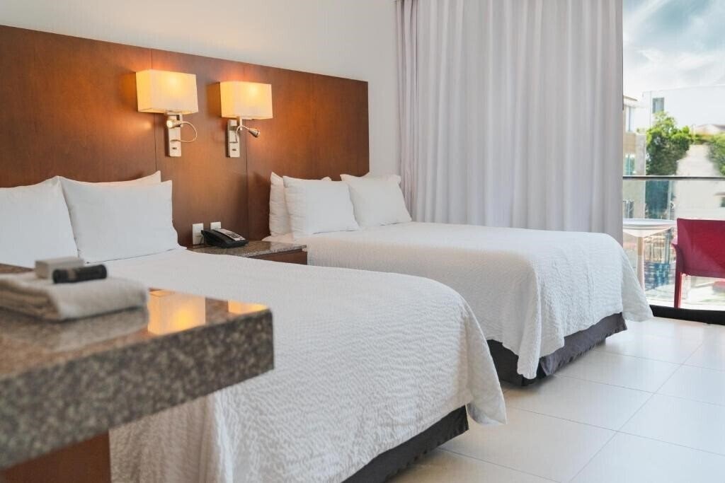 Вид Fiesta Inn Playa Del Carmen 4*