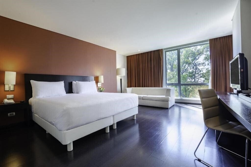 Фото Nh Puebla 4*