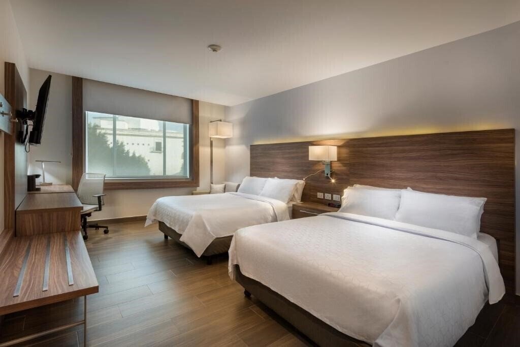 Отель Holiday Inn Express Puebla 3*