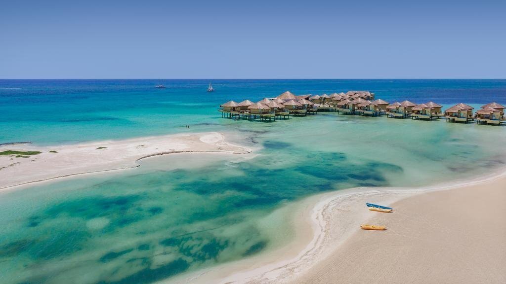 Отель Palafitos Overwater Bungalows, By Karisma 5*