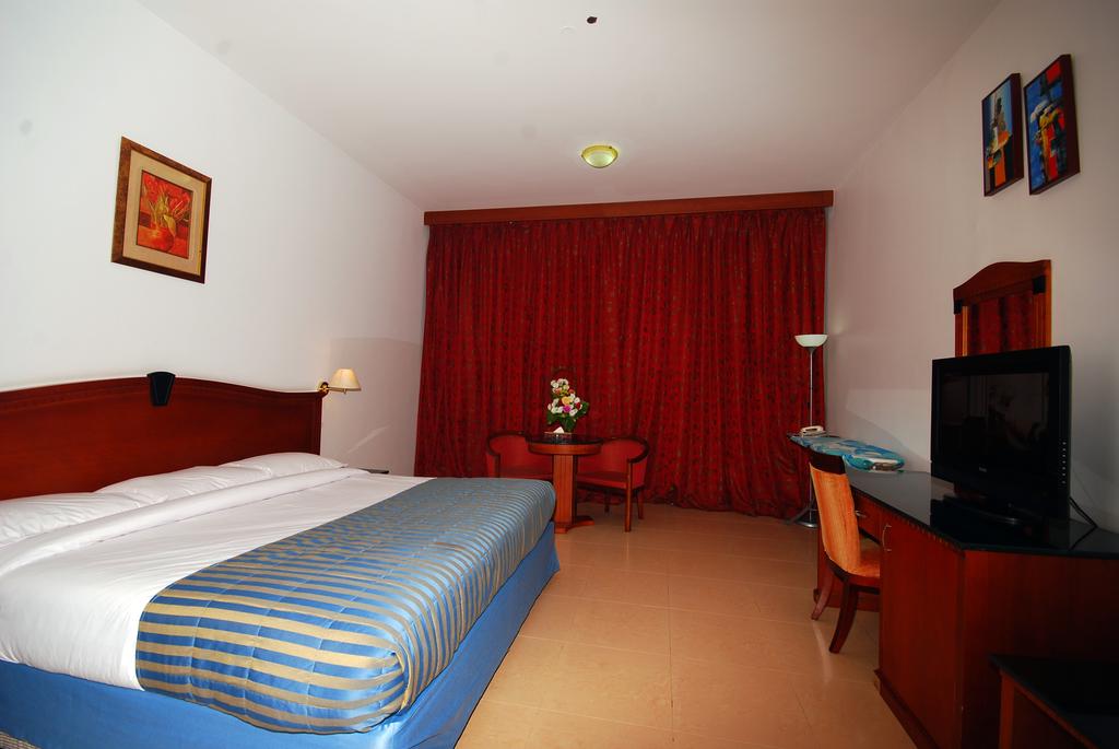 Вид Ramee Garden Hotel Apartments 3*