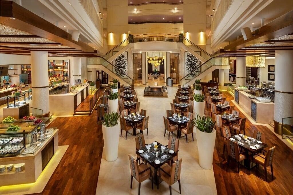 Апартаменты Beach Rotana All Suites 5*