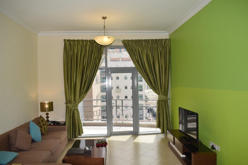 Фото Al Waleed Holiday Homes - Al Barsha (ex. Al Waleed Palace Hotel Apartments ) 4*