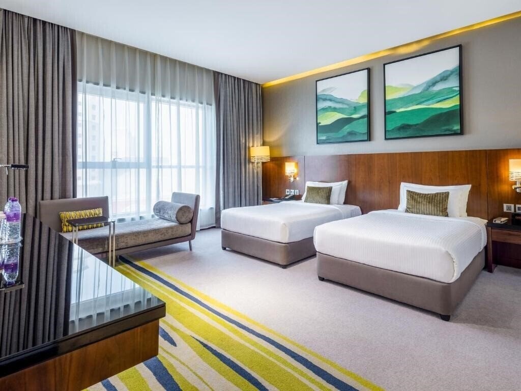 Апартаменти Flora Al Barsha Hotel Dubai 4*