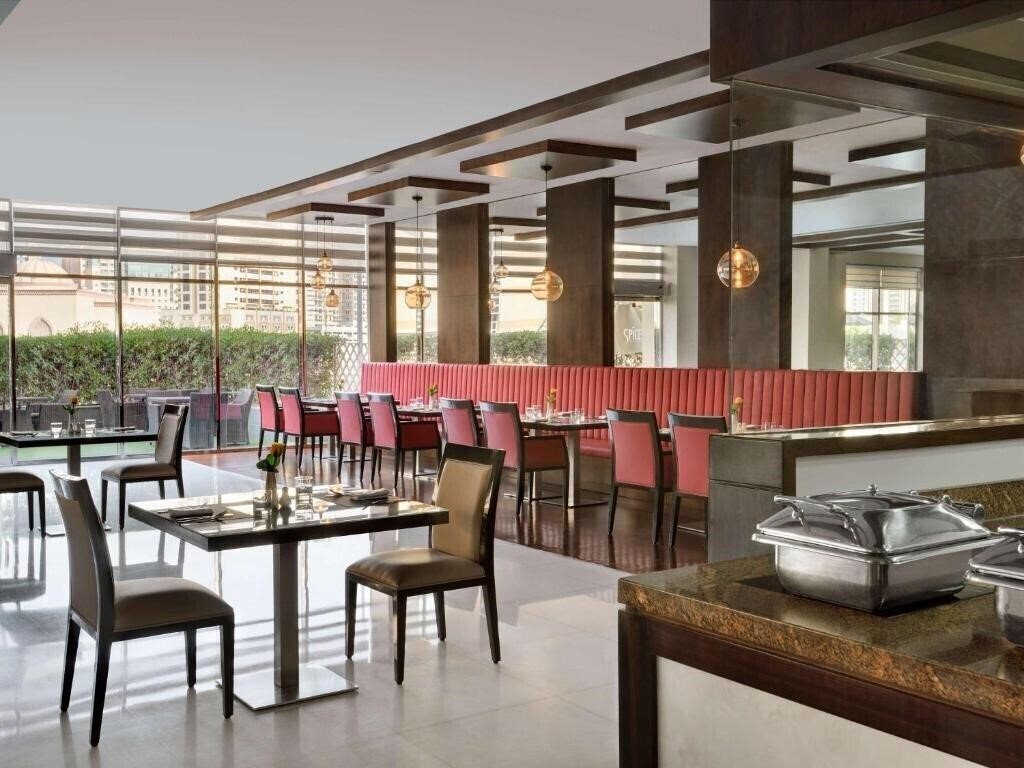 Апартаменты Movenpick Al Mamzar 5*