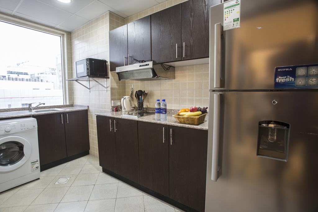 Апартаменти Travellers Hotel Apartment апартаменты