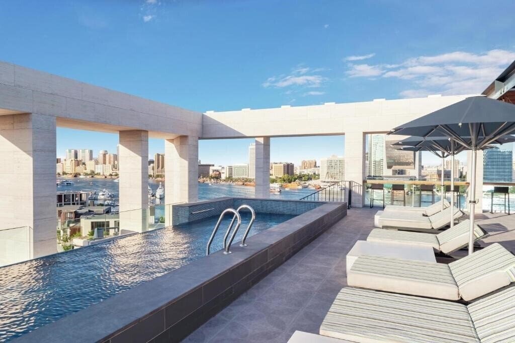 Отель Canopy by Hilton Dubai Al Seef 4*