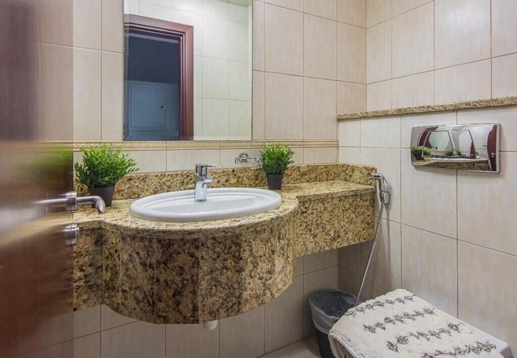 Фотографія Espace Holiday Homes - Princess Tower 25 Apartment апартаменты