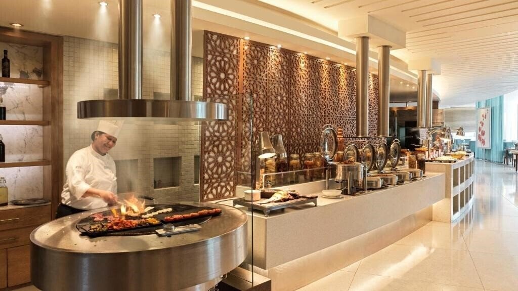 Апартаменты Raffles Dubai 5*