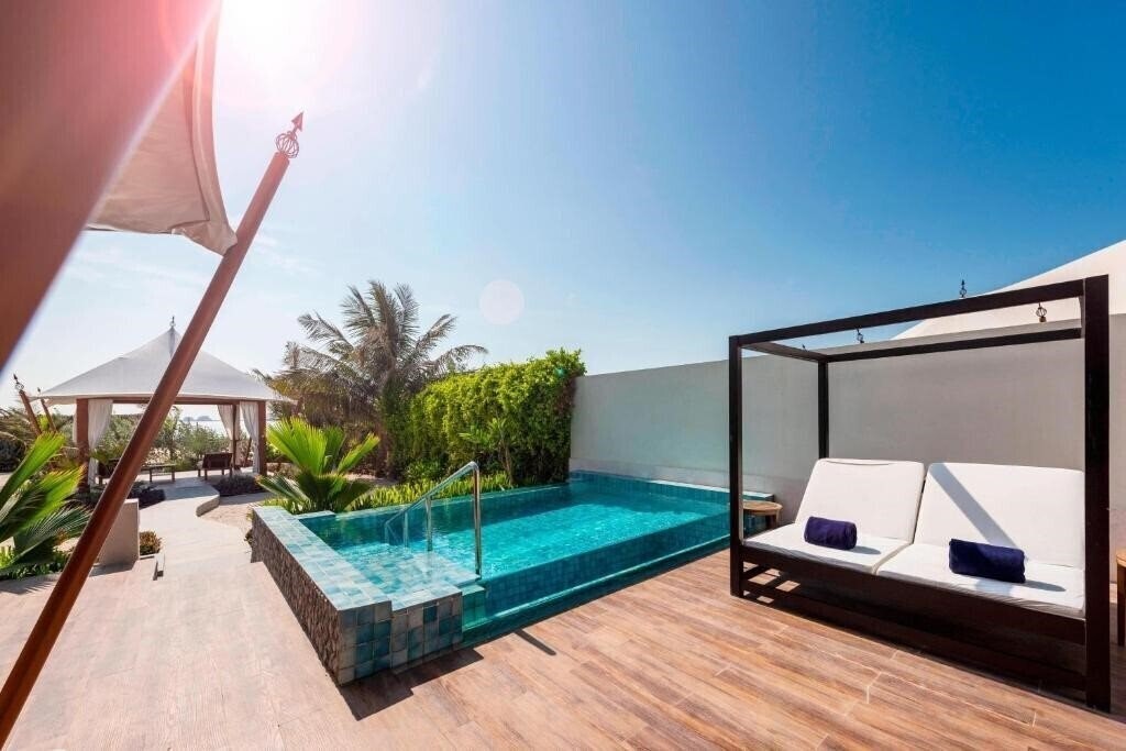 Апартаменты The Ritz Carlton Ras Al Khaimah Al Hamra Beach 5*