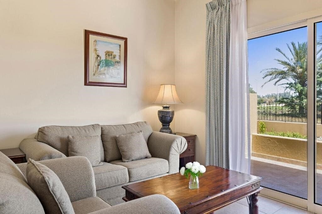 Апартаменты Al Hamra Village Golf & Beach Resort 4*