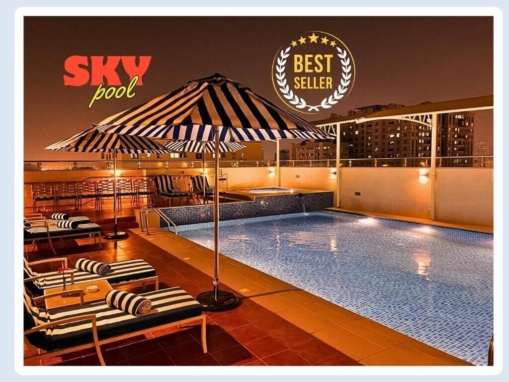 Отель Al Hamra Hotel 4*