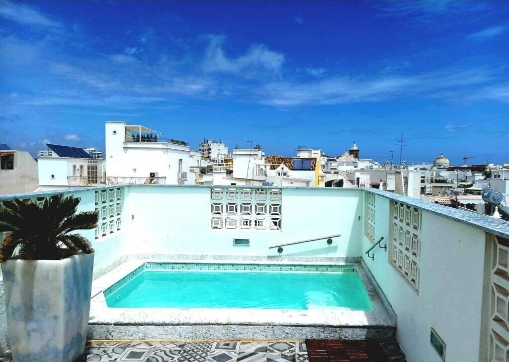 Отель The Patio Suite Hotel 4*