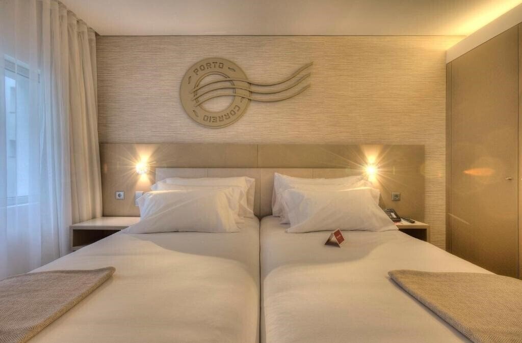Апартаменты Nh Collection Porto Batalha 4*