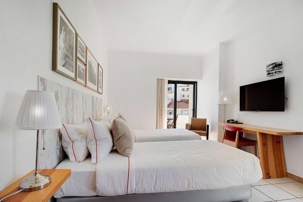 Апартаменти Hotel Carvoeiro Plaza 3*
