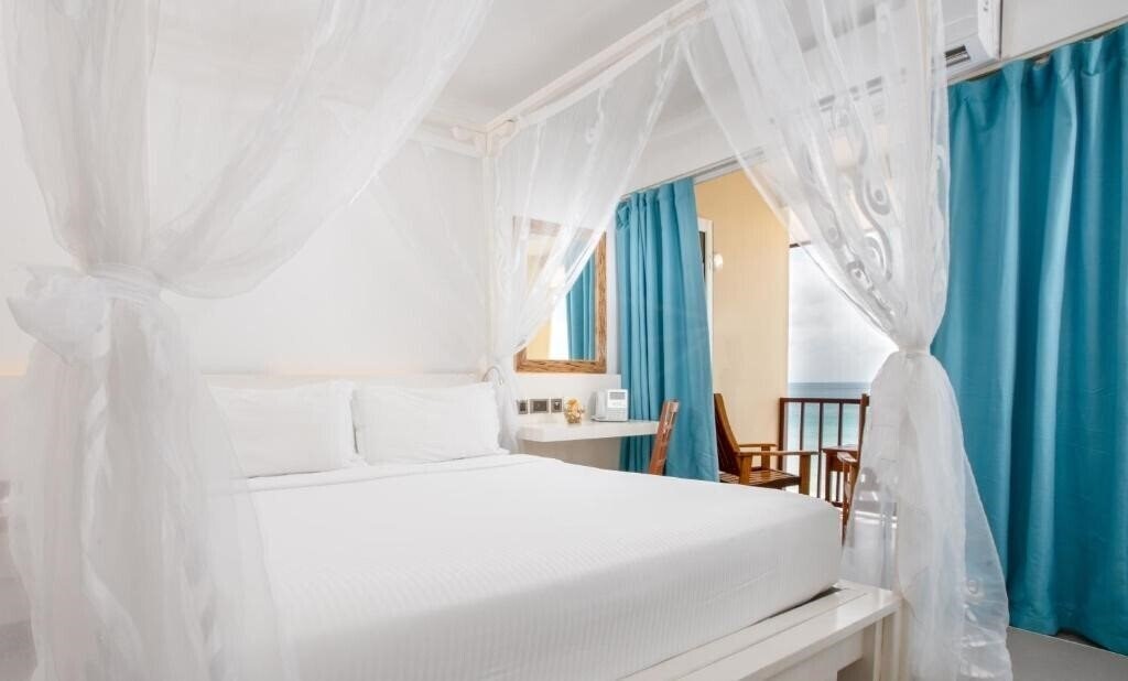 Апартаменты Savoy Hotel Coral Strand Seychelles 4*