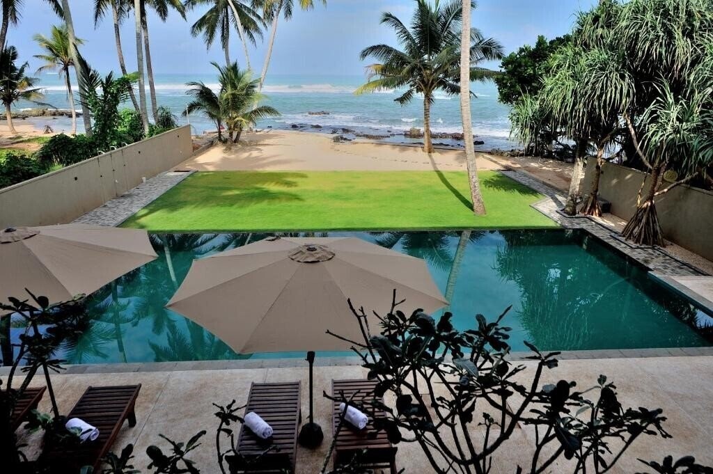 Вид Tantalize Beach Resort 3*