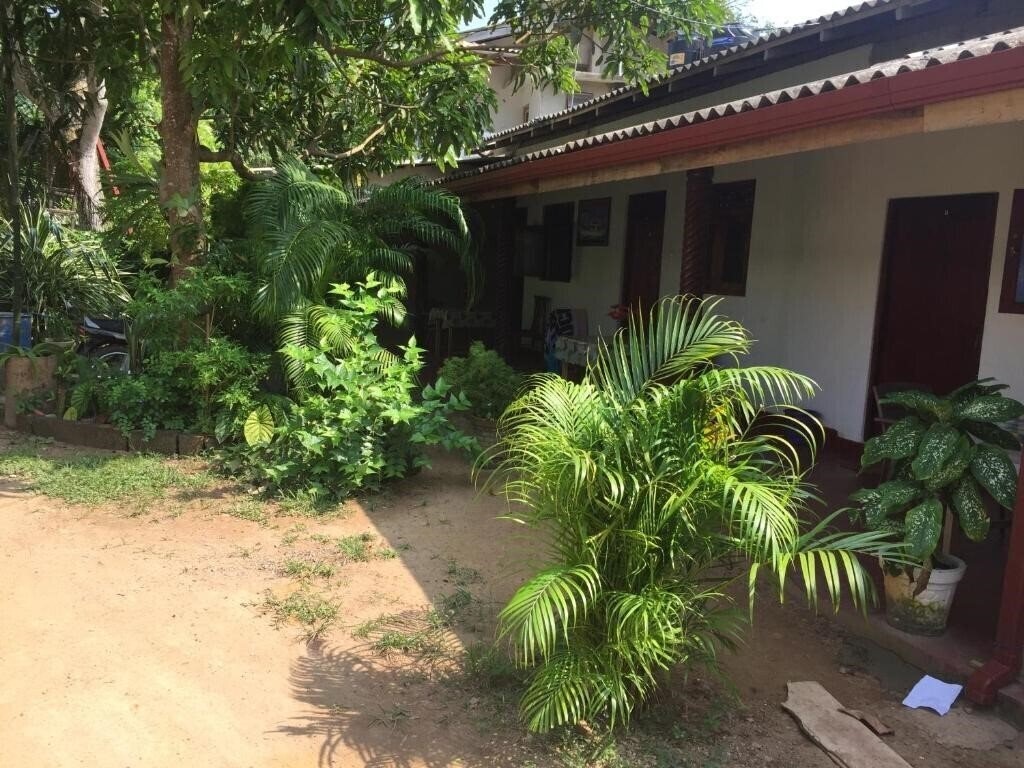 Вид Margosa Guesthouse гостиный двор