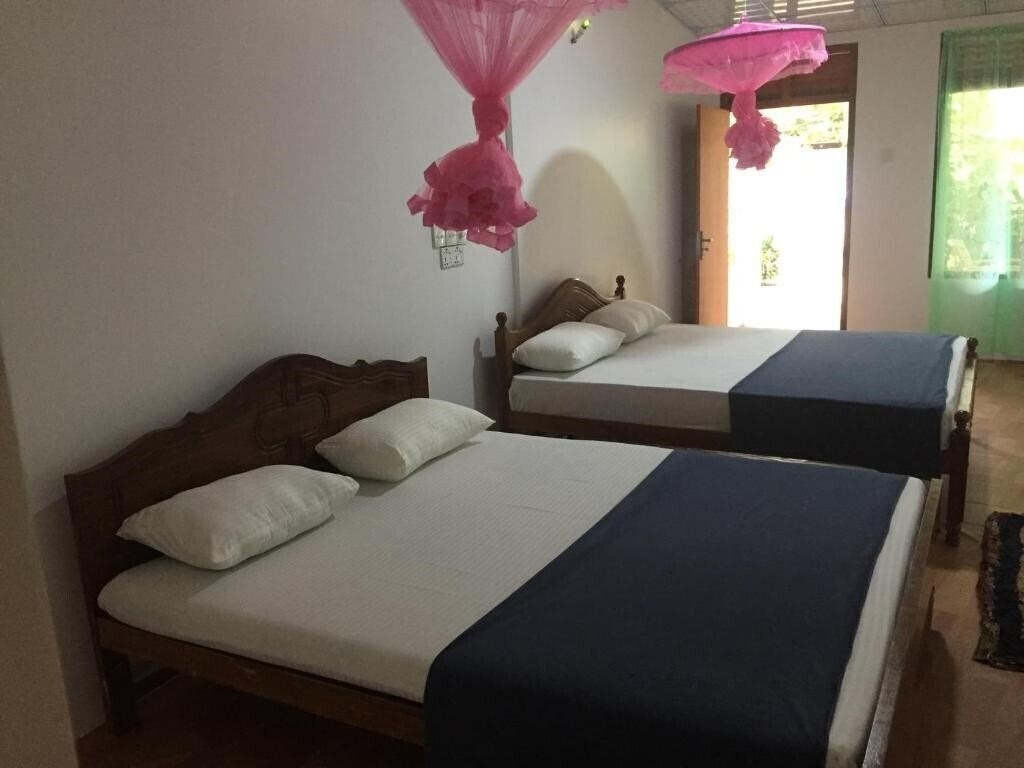 Апартаменты Margosa Guesthouse гостиный двор