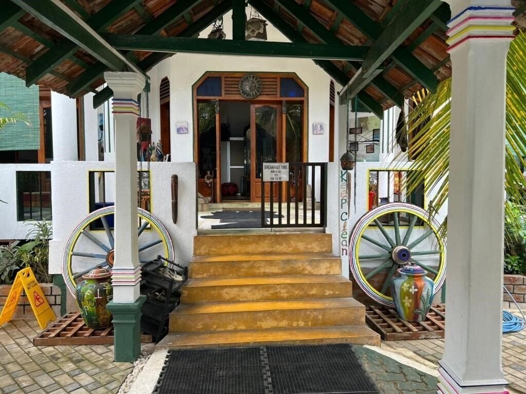 Отель Frangipani Beach Villa 4*