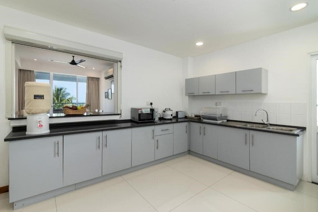 Апартаменты Oceanfront Condos Nilaveli Apartment 4*