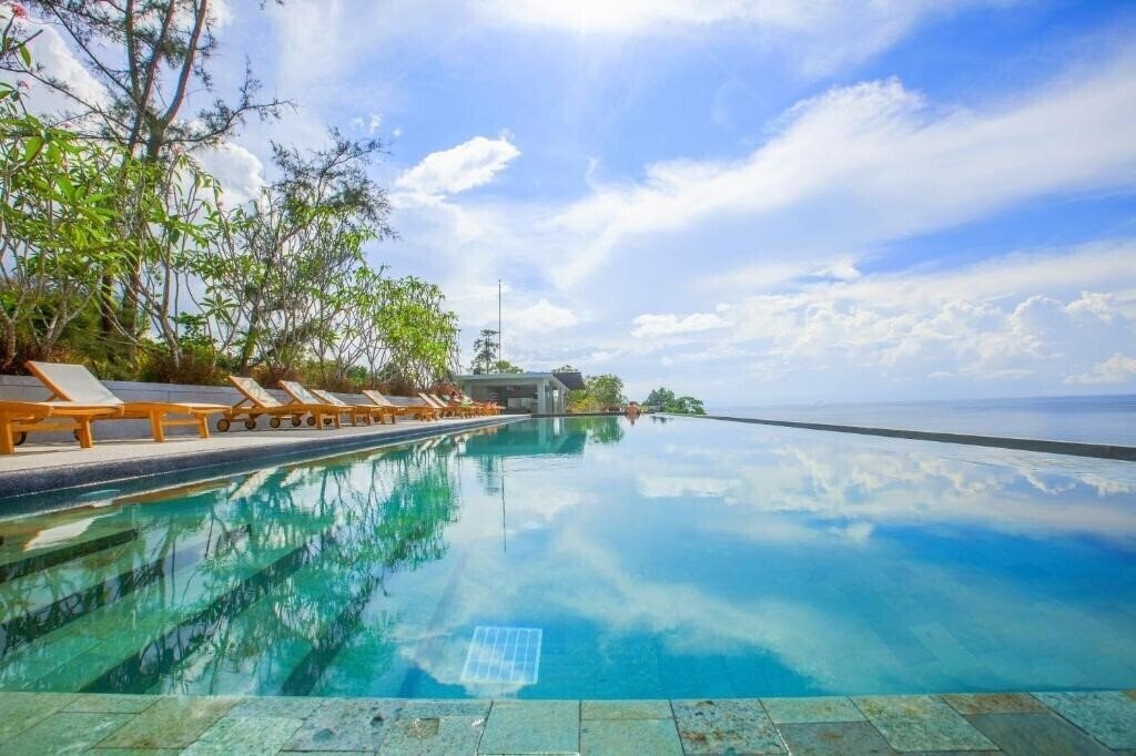 Апартаменты Norn Talay Surin Beach 4*