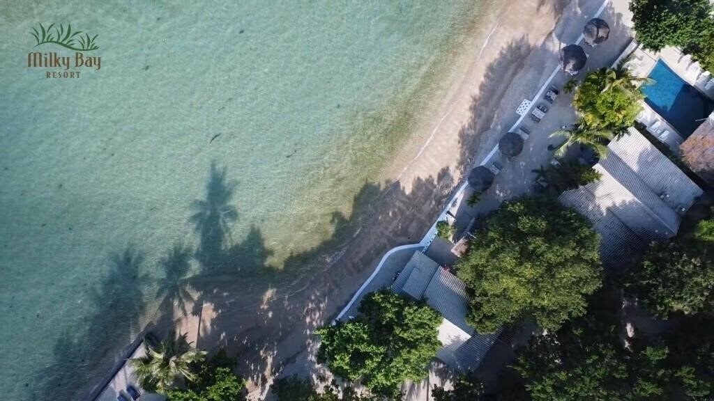 Отель Milky Bay Resort 3*