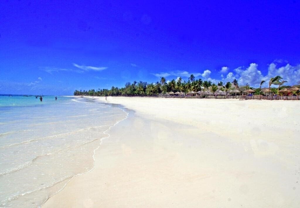 Апартаменты Dongwe Beach Club & Resort 4*