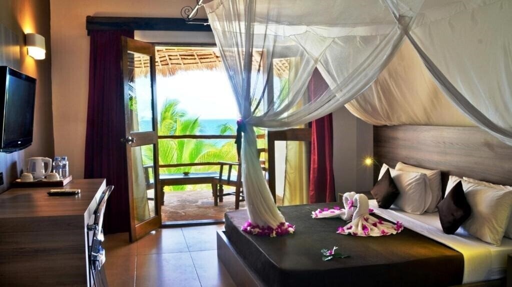 Фотография My Blue Nungwi Beach Resort 4*