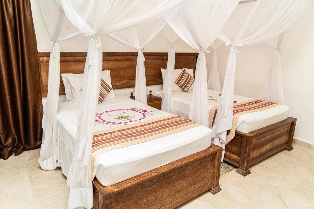 Апартаменты Zanzibar Bahari Villas 4*
